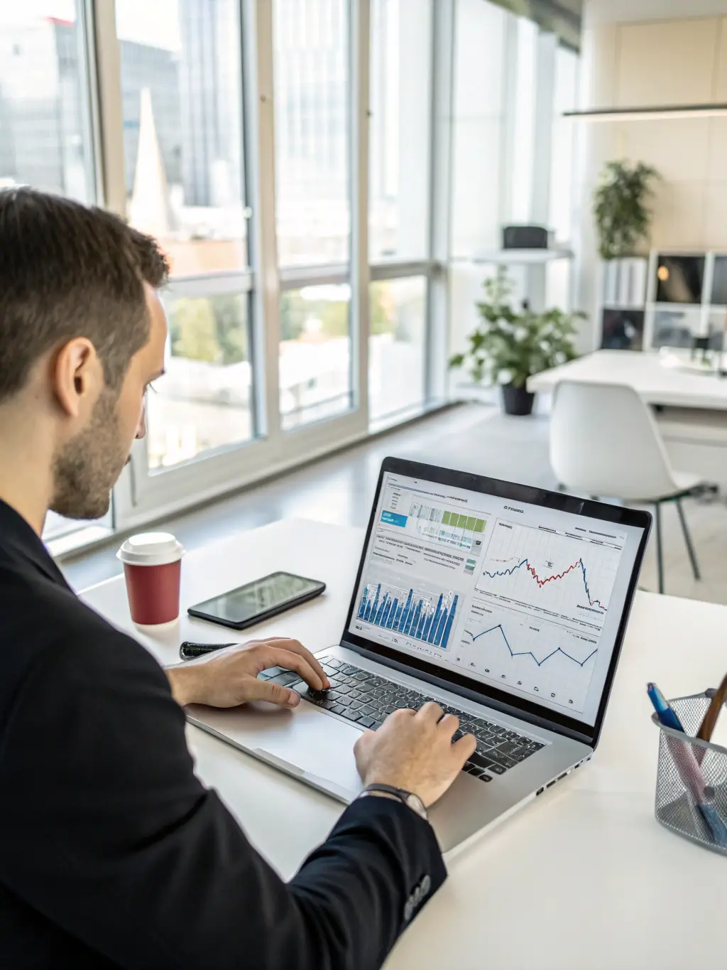 A professional photo of a financial analyst using AI-powered software to predict market trends, set in a modern office environment. The image should convey trust and innovation.